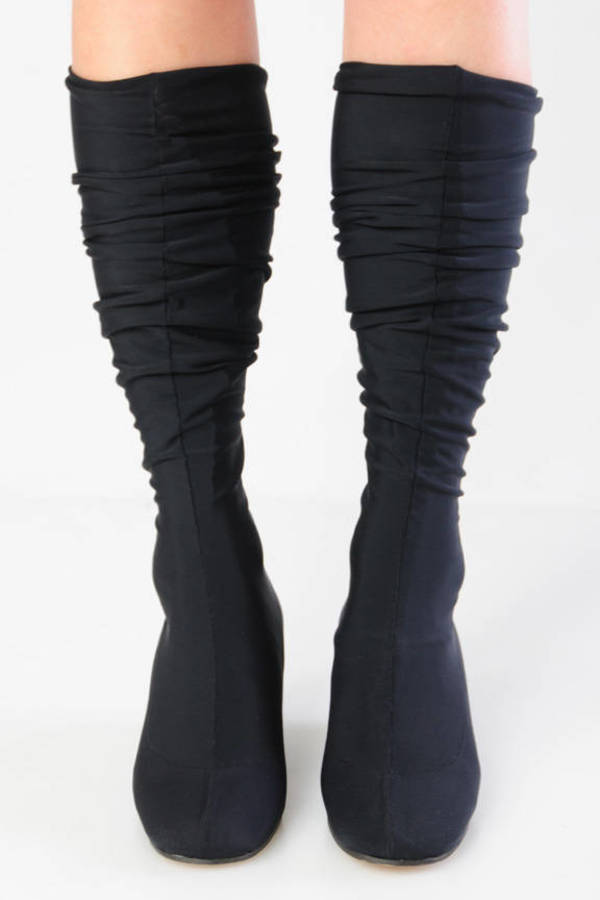 black stretch wedge boots