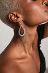 Retrograde Silver Textured Dangle Earrings